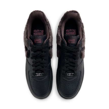 Nike Air Force 1 Low Retro in black leather with textured faux-fur accents and brown inner linings, top-down view.