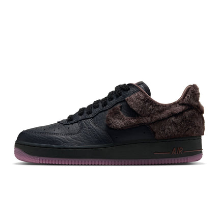 Nike Air Force 1 Low sneaker featuring black pebbled leather with dark brown faux fur side panels and a pink outsole.