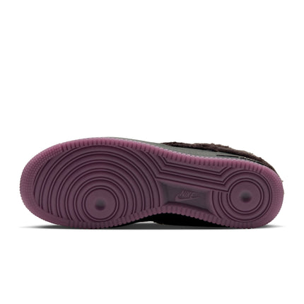 Nike Air Force 1 Low shoe in baroque brown fuzzy material with a textured purple rubber outsole, viewed from below.