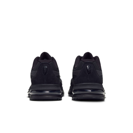 Rear view of Nike Air Max Metro sneakers featuring an all-black colorway with suede accents and a visible air unit.