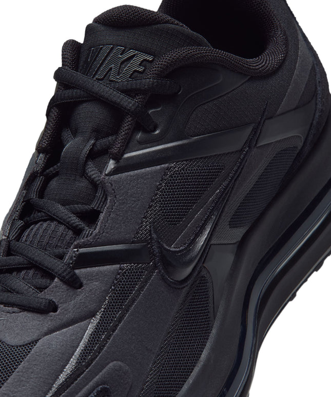 Nike Air Max Metro sneaker in triple black featuring mesh and synthetic overlays with a sleek, low-top silhouette.