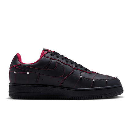 Nike Air Force 1 low-top sneaker in black leather with gym red contrast stitching and metallic silver stud accents.