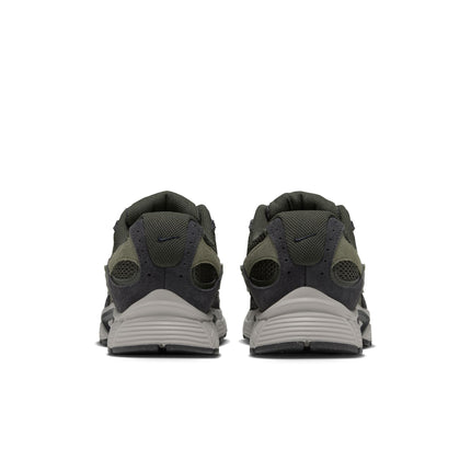Rear view of Nike V5 RNR sneakers in olive green and black suede with textured mesh and light grey foam midsoles.