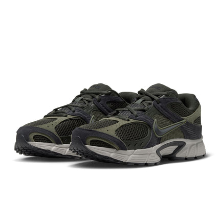 Nike V5 RNR running shoes in olive green and black suede and mesh with a grey midsole, shown in a side profile view.