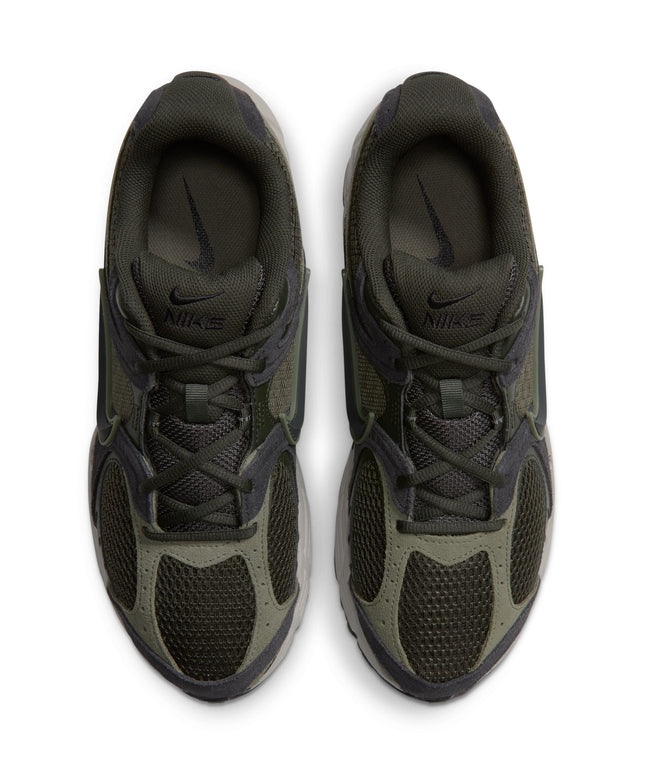 Top-down view of Nike V5 RNR sneakers in olive green mesh and suede with black accents on a white background.
