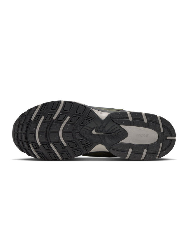 Bottom view of the black and dark olive Nike V5 RNR sneaker, featuring a textured rubber outsole with Nike branding.
