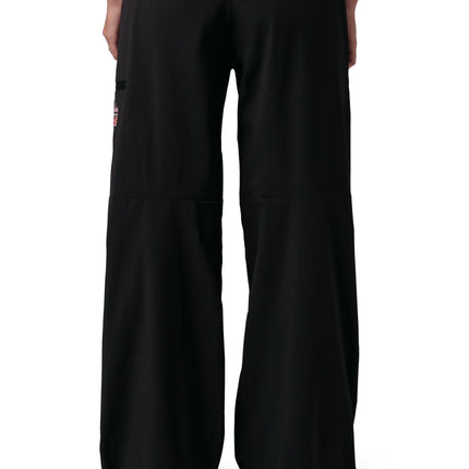 Back view of Air Jordan women's Sport Dome Jam track pants in matte black with a relaxed, wide-leg utility fit.