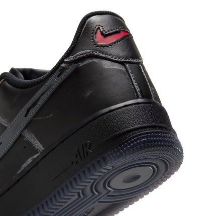 Black Nike Air Force 1 07 leather heel featuring a stitched gym red Swoosh logo and dark translucent rubber sole.