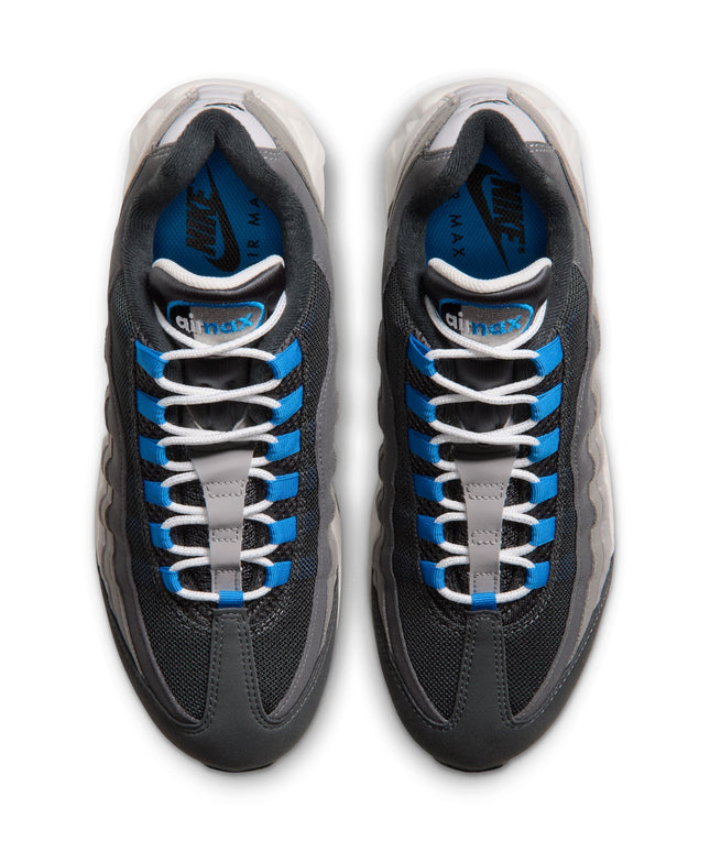 Top-down view of Nike Air Max 95 sneakers in anthracite and light graphite mesh with vibrant blue spark lace loops.