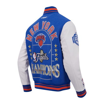 Pro Standard New York Knicks 2026 Finals Champions blue varsity jacket with white leather sleeves and embroidered logos.
