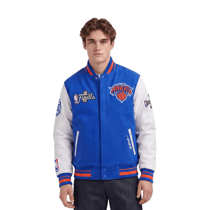 Pro Standard New York Knicks 2026 Finals blue wool varsity jacket with white leather sleeves and embroidered logos.