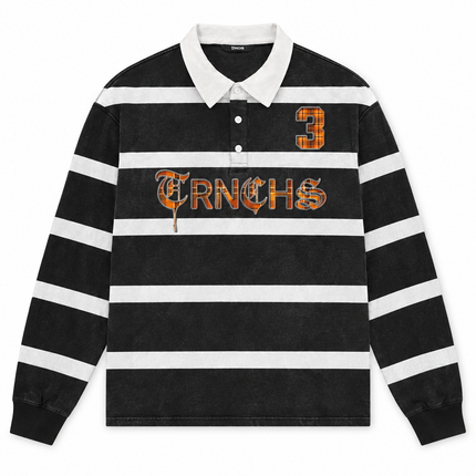 Trnchs black and white striped long-sleeve polo with a vintage wash, orange plaid text logo, and number 3 applique.
