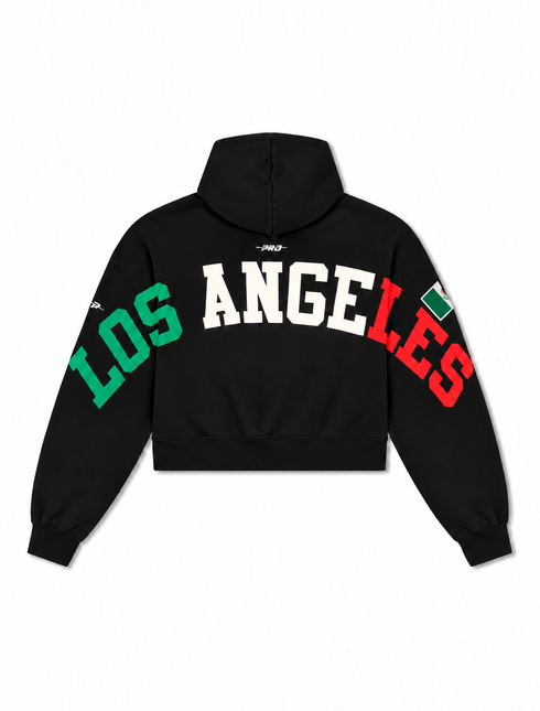 Pro Standard womens black cropped hoodie featuring arched LOS ANGELES lettering in green, white, and red with flag detail.