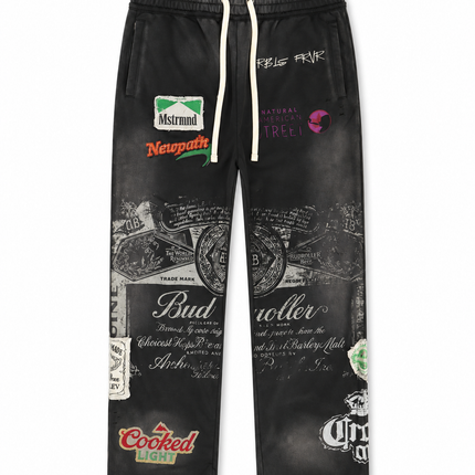 Rebel Minds Jack of All Trades joggers in black leather with multicolor brand-inspired patches and graphic prints.