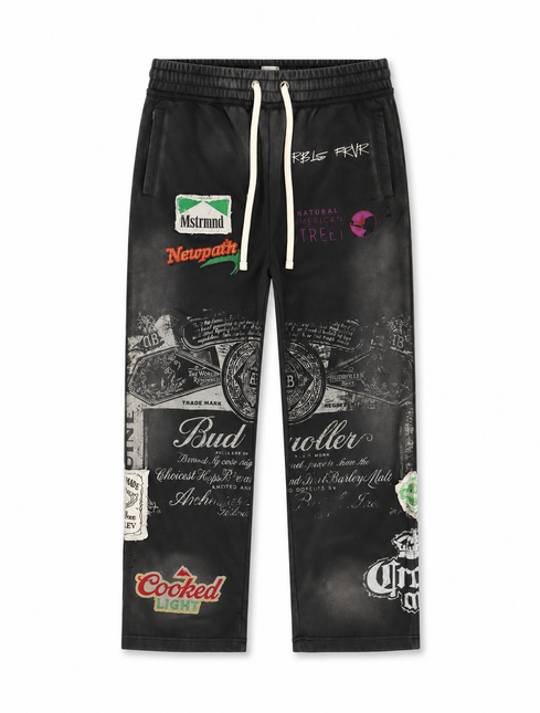 Rebel Minds Jack of All Trades joggers in black leather with multicolor brand-inspired patches and graphic prints.