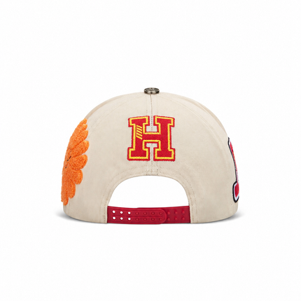 All Human EBT cap back view in cream cotton with a red and yellow embroidered H logo and a red adjustable snapback.
