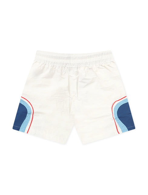 Syndicate white nylon athletic shorts featuring an elastic waistband and blue side panels with curved red piped accents.