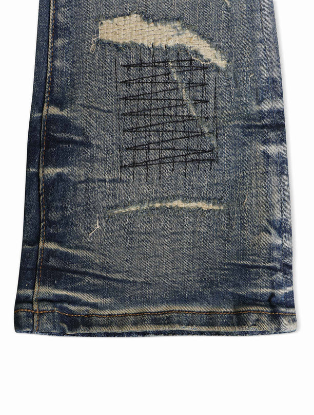 Damati Distressed Stacked Fit Jeans - Vintage Blue