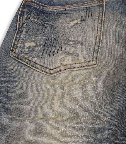 Damati Distressed Stacked Fit Jeans - Vintage Blue