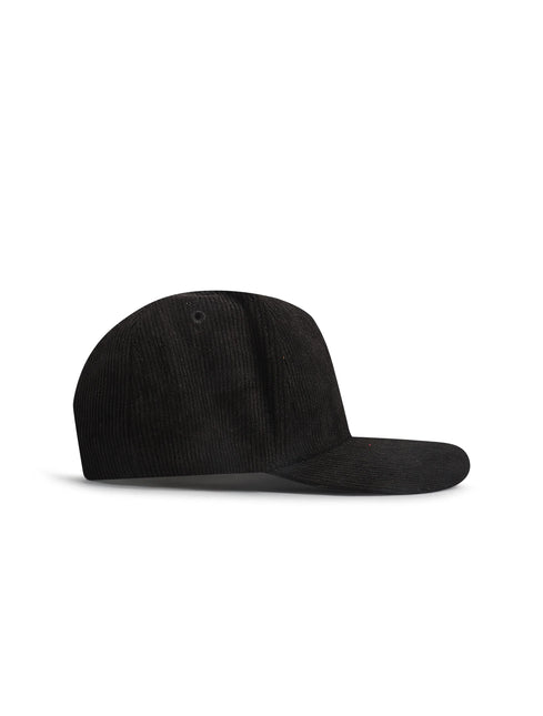 Green cap with brown leather strap on a white background