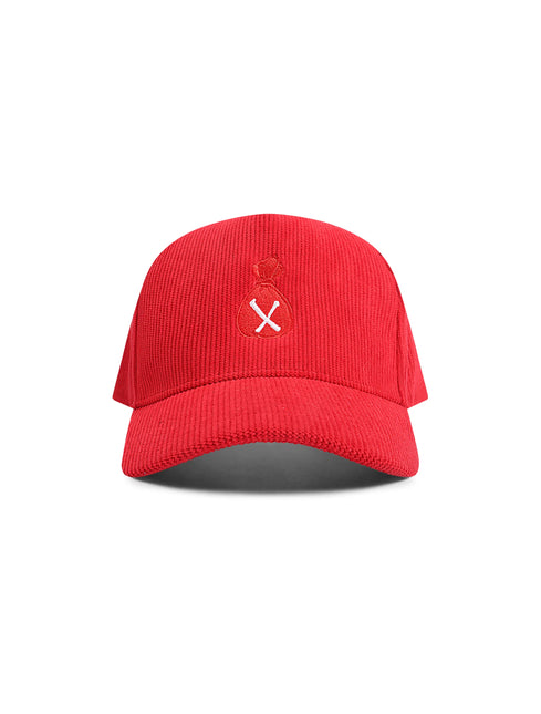A red corduroy baseball cap with a small white embroidered logo on the front, set against a plain white background.