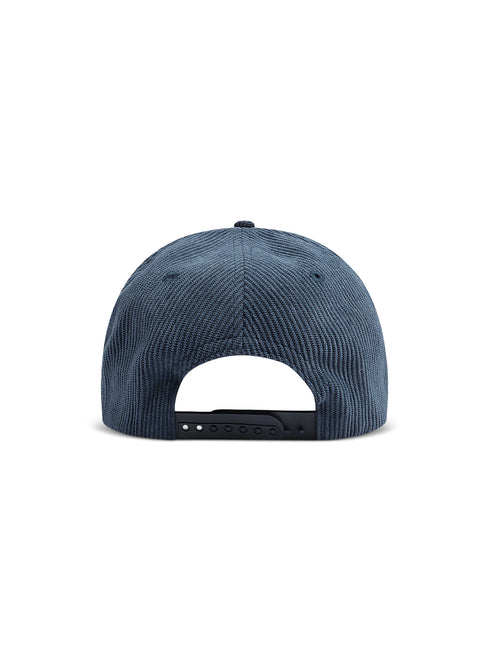 The back view of a blue corduroy snapback cap on a solid white background.