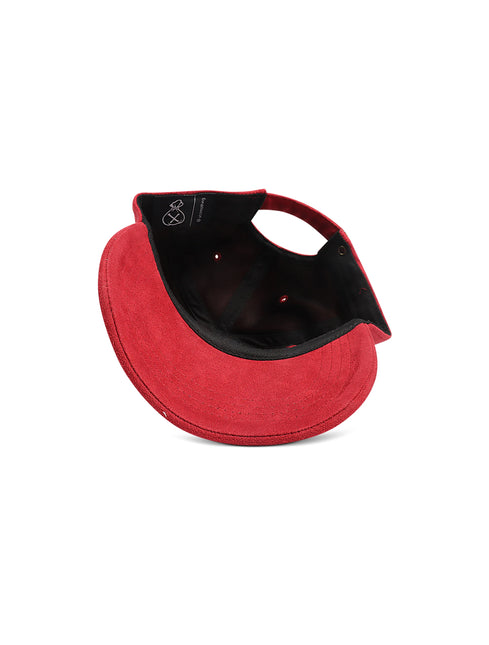 A red suede visor hat with a black interior lining, shown from a side angle on a plain white background.
