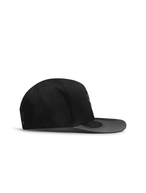 Piece Of Art Fire LA hat in black, featuring a textured snakeskin-style brim with a sleek flame-shaped trim design.