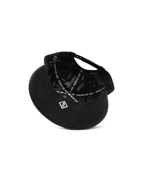 Black Piece Of Art Fire LA hat seen from below, featuring a black satin lining with repeating white text and logos.