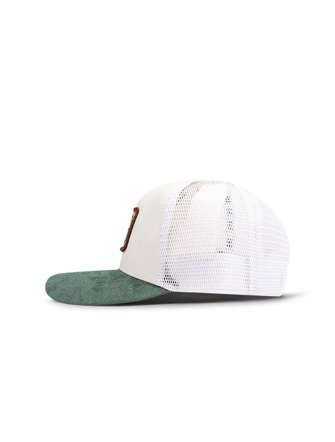 Side view of a white mesh-back baseball cap with a green corduroy brim and a small brown patch.