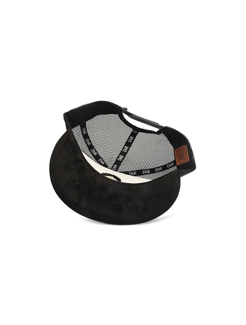 Drunk & Rich trucker hat featuring a black suede brim, black mesh back, and an interior brown branded leather patch.