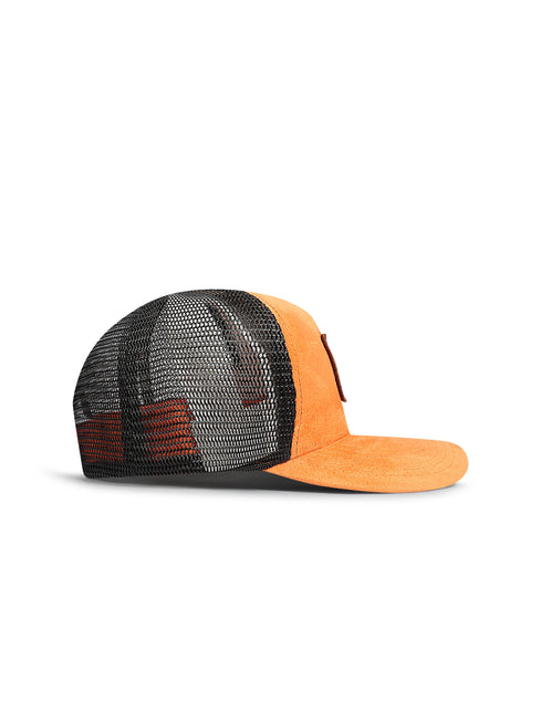 Side profile of a Drunk & Rich trucker hat featuring a vibrant orange suede front panel, brim, and black mesh back.