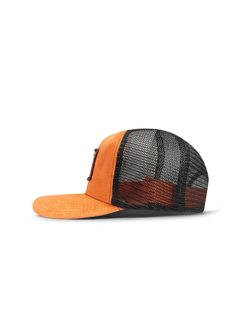 Drunk & Rich trucker hat featuring an orange suede front panel and brim with a breathable black mesh back, side view.