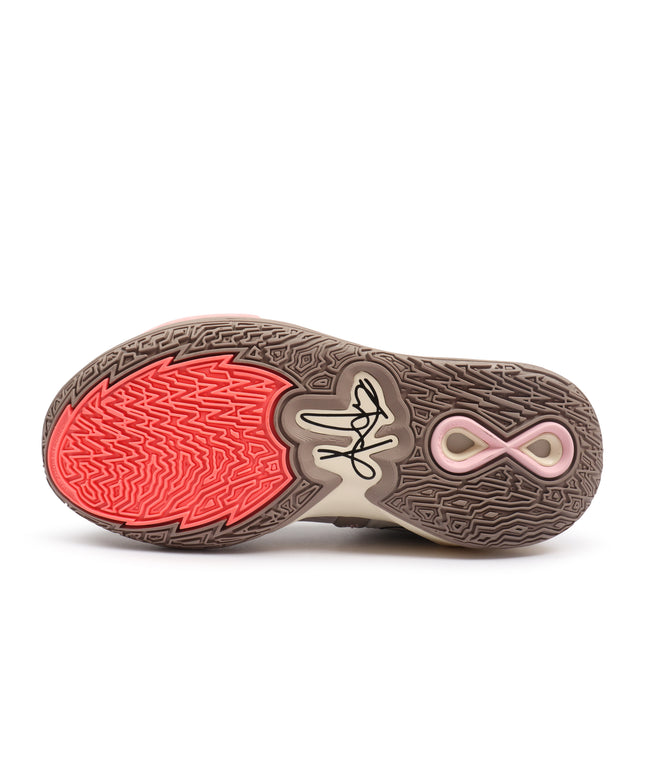 Bottom view of a Nike Kyrie Infinity sneaker featuring a red forefoot tread, brown rubber sole, and a pink infinity logo.