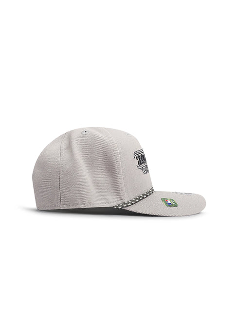 Side view of a light gray snapback baseball cap with a rope detail along the brim and a small logo patch.