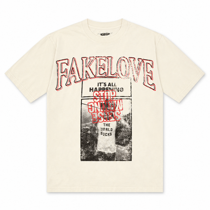 Off-white short-sleeve KOFL t-shirt featuring a vintage-style black and red graphic print with FAKELOVE text.