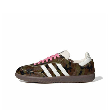 Adidas Womens Samba OG sneaker in multicolor camo print pony hair featuring white stripes and bright pink laces.