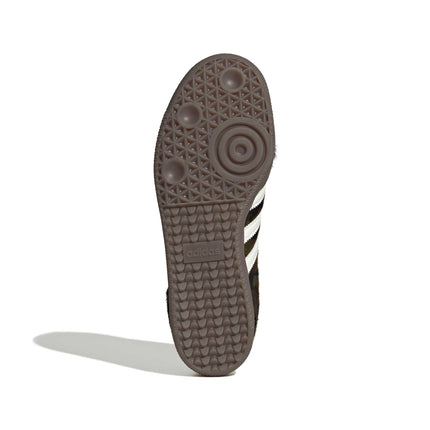 Bottom view of Adidas Samba OG sneaker featuring a brown textured faux fur upper and a classic gum rubber outsole.