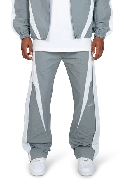 EPTM Legacy joggers in grey crinkle nylon featuring a relaxed fit, white contrast side panels, and a subtle logo.