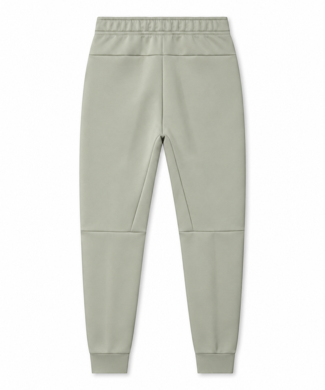 Back view of Nike Mens Tech Fleece joggers in light army green, featuring a smooth finish and tapered ribbed cuffs.