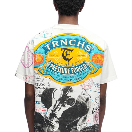 Back view of white Trnchs cotton t-shirt featuring a gas mask graphic, vintage travel stamps, and bold yellow logo.