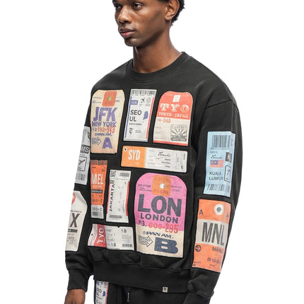 Trnchs Airmail crewneck sweater in black cotton fleece featuring an all-over print of vintage international luggage tags.