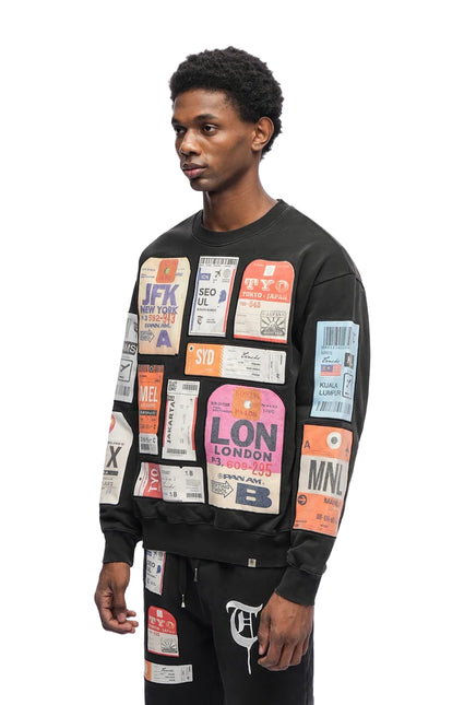 Trnchs Airmail crewneck sweater in black cotton fleece featuring an all-over print of vintage international luggage tags.
