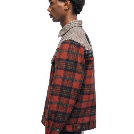 Trnchs Heritage button-down shirt in orange plaid flannel with a contrasting gray and white houndstooth upper back.
