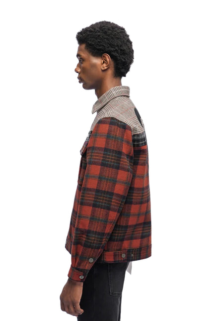Trnchs Heritage button-down shirt in orange plaid flannel with a contrasting gray and white houndstooth upper back.
