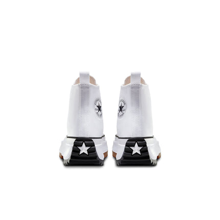 Rear view of white canvas Converse Run Star Hike sneakers featuring a black rubber heel patch with a white star.