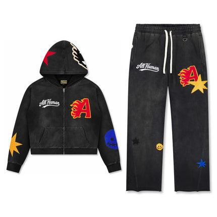 All Human Spitfire V2 black washed cotton hoodie and sweatpants set featuring colorful star and letter patch graphics.