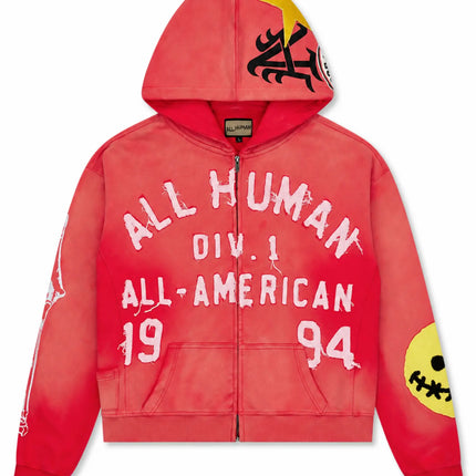 Red washed All Human zip-up hoodie featuring white distressed varsity lettering, a hood graphic, and smiley patch.
