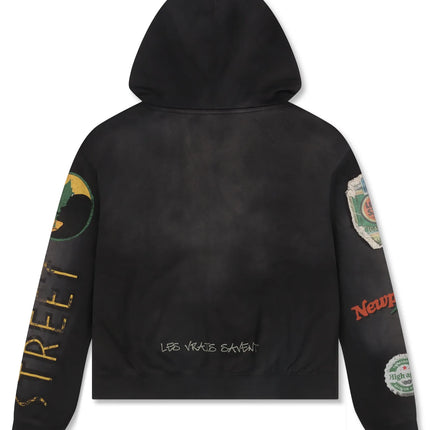 Rebel Minds Jack of All Trades black cotton hoodie featuring various vintage-style graphic patches on the sleeves.