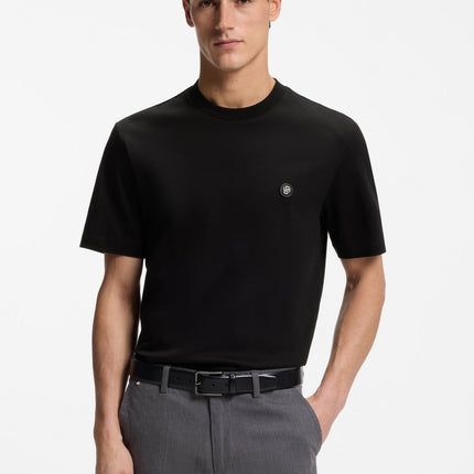 Black Boss short-sleeved cotton T-shirt featuring a subtle circular Double-B monogram badge on the chest.